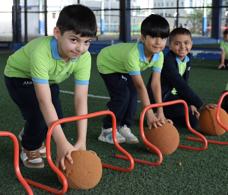 Kindergarten children taking part in a PE session