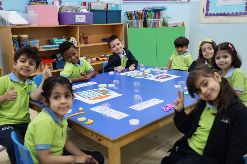 Children working in a small-group learning station